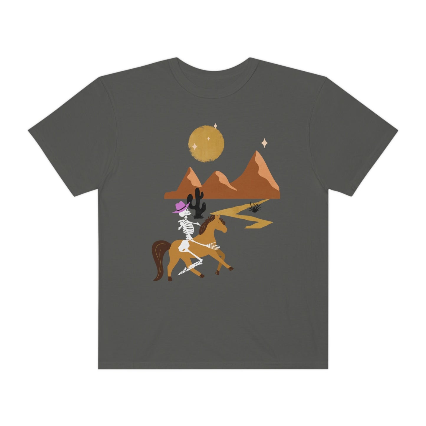 A vintage, pepper colored shirt with a skeleton cowgirl wearing a pink cowboy hat riding a brown horse through the eset at night, cacti and three mountains in the background with a full moon and stars in the sky.