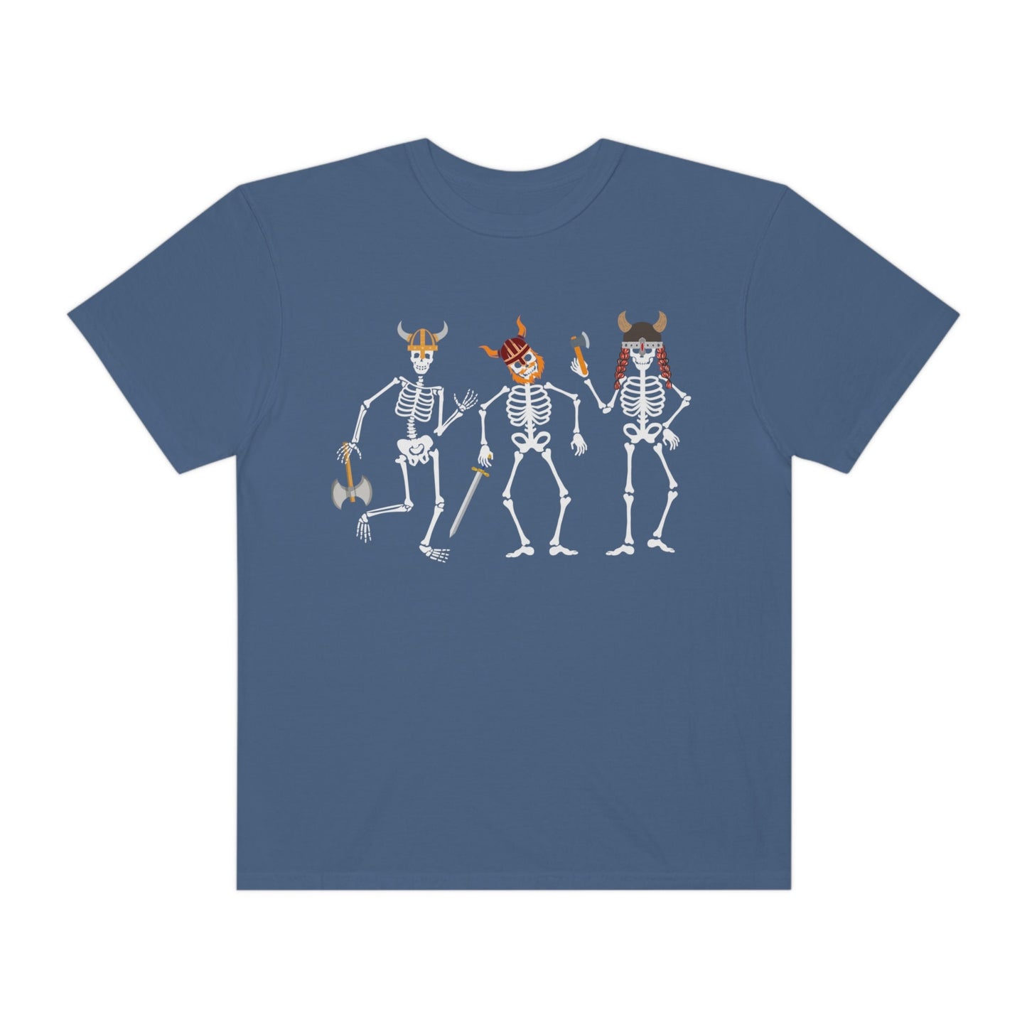A vintage, navy blue colored shirt with three skeletons wearing horned helmets dressed as vikings. One is holding a battle axe, another has a red beard and a sword, and the third has long red hair and is wielding a hatchet.