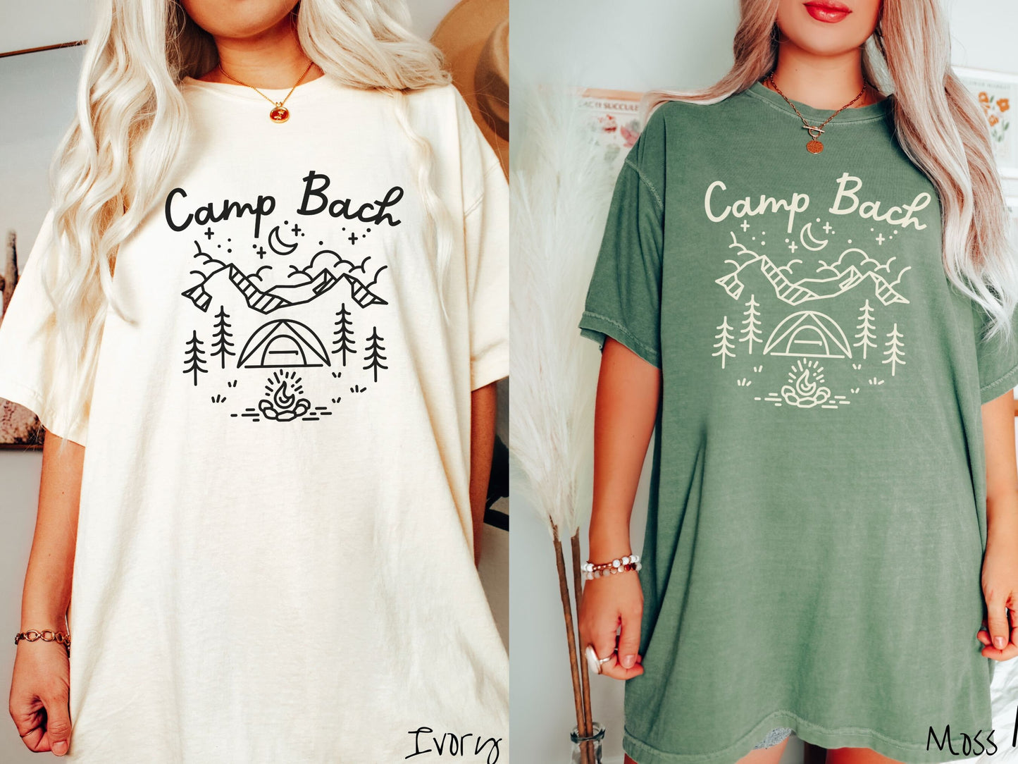 Two women wearing cute, vintage ivory and moss colored Comfort Colors t-shirts with text Camp Bach in white, cursive font. Above the text are outlines of mountains, trees, stars, a tent, campfire, and a stream.