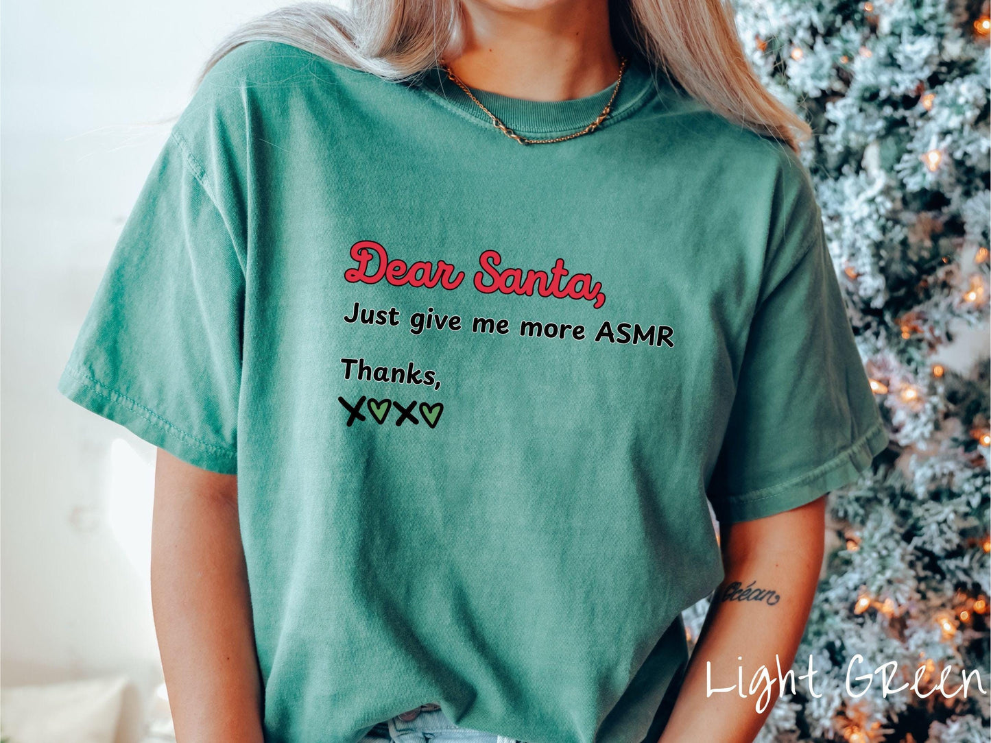A cute, vintage light green colored Comfort Colors T-shirt with the text in red, black, and green font: Dear Santa, Just give me more ASMR Thanks, X <3 X <3.
