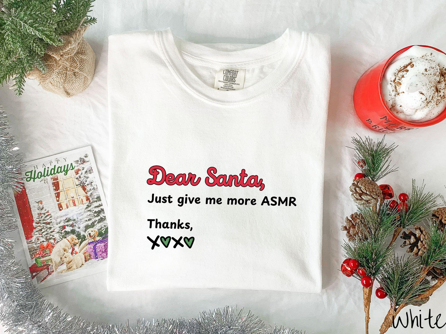 A cute, vintage white colored Comfort Colors T-shirt with the text in red, black, and green font: Dear Santa, Just give me more ASMR Thanks, X <3 X <3.