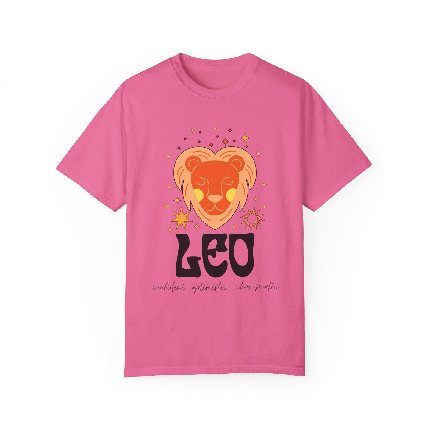 This vintage crunchberry colored Comfort Colors T-shirt features a large orange and yellow lion surrounded by stars and the sun with the text Leo in large bold font and below that are the words confident, optimistic, charismatic in cursive font.