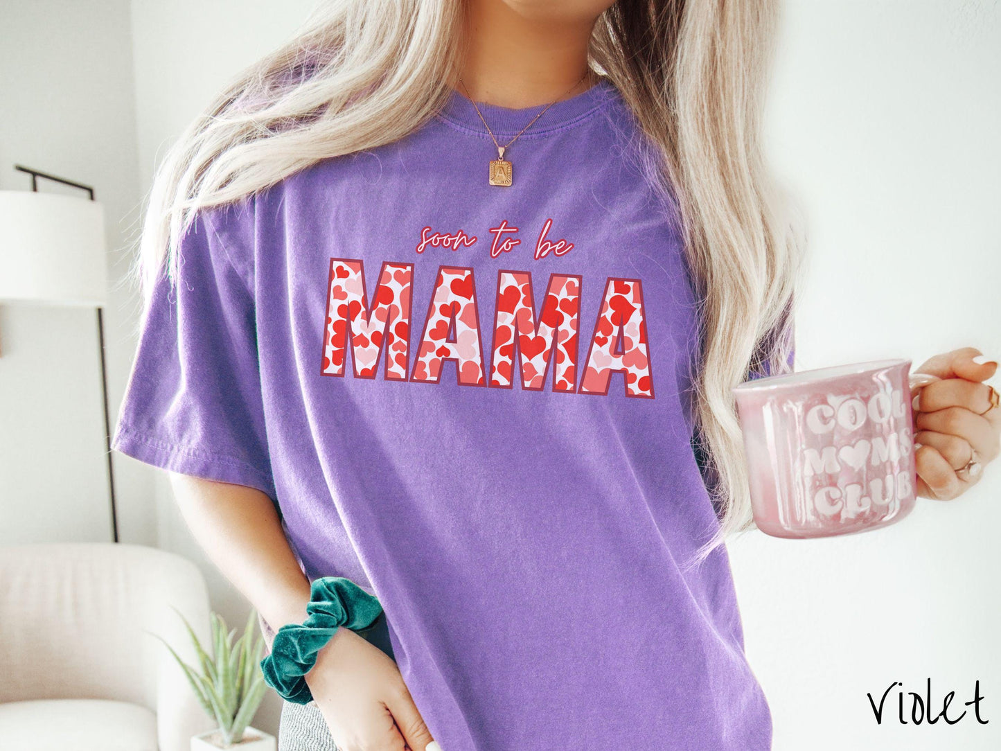Celebrate your journey to motherhood with this vintage Comfort Colors t-shirt featuring the phrase “Soon to Be Mama” in bold red font, and the word “Mama” stands out in block letters filled with colorful hearts for a playful and charming touch.