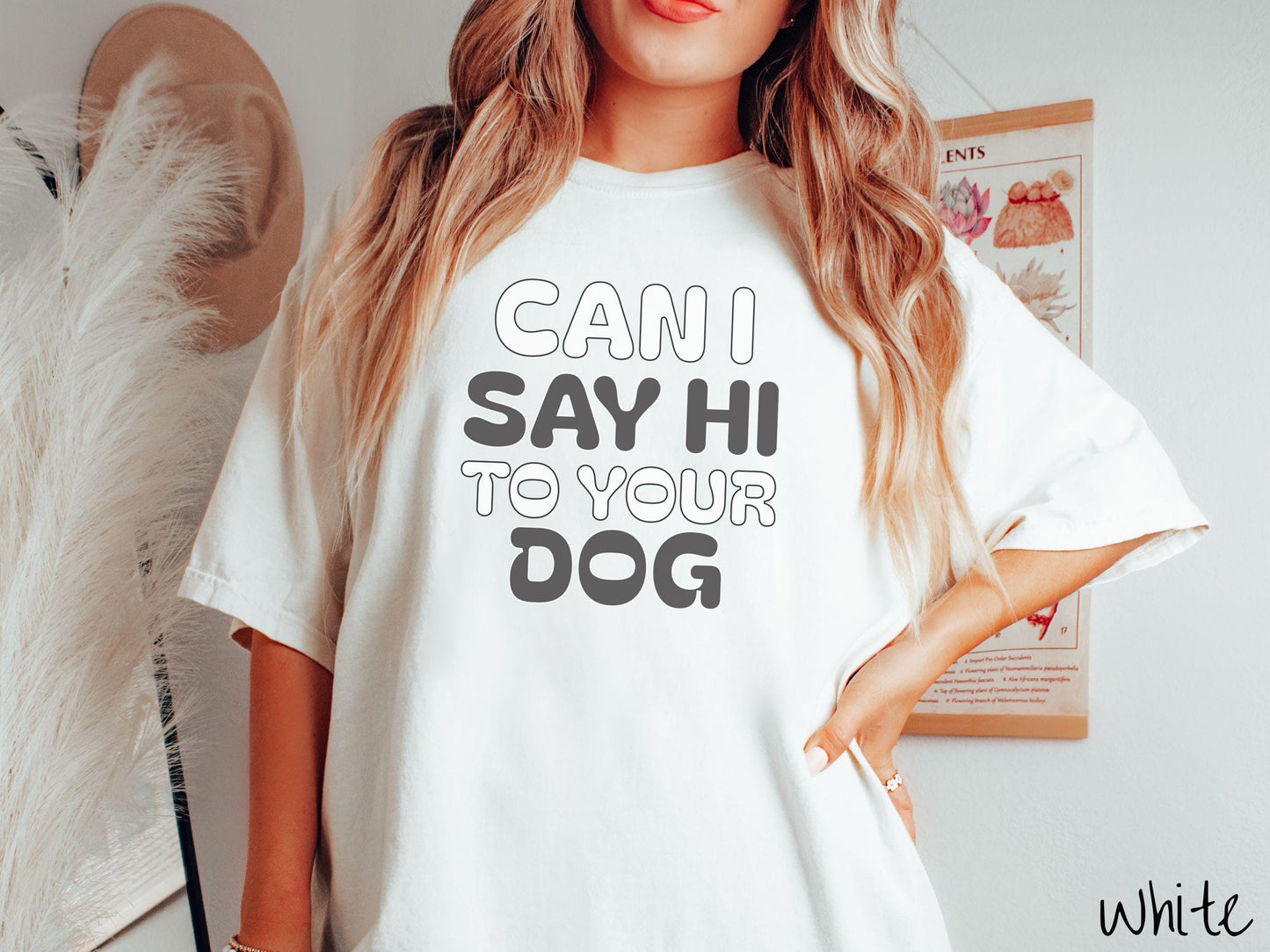 This vintage Comfort Colors t-shirt is perfect for dog lovers who want to make a bold statement. Featuring the text "CAN I SAY HI TO YOUR DOG" in uppercase black and white font, this shirt combines comfort and style with a playful message.
