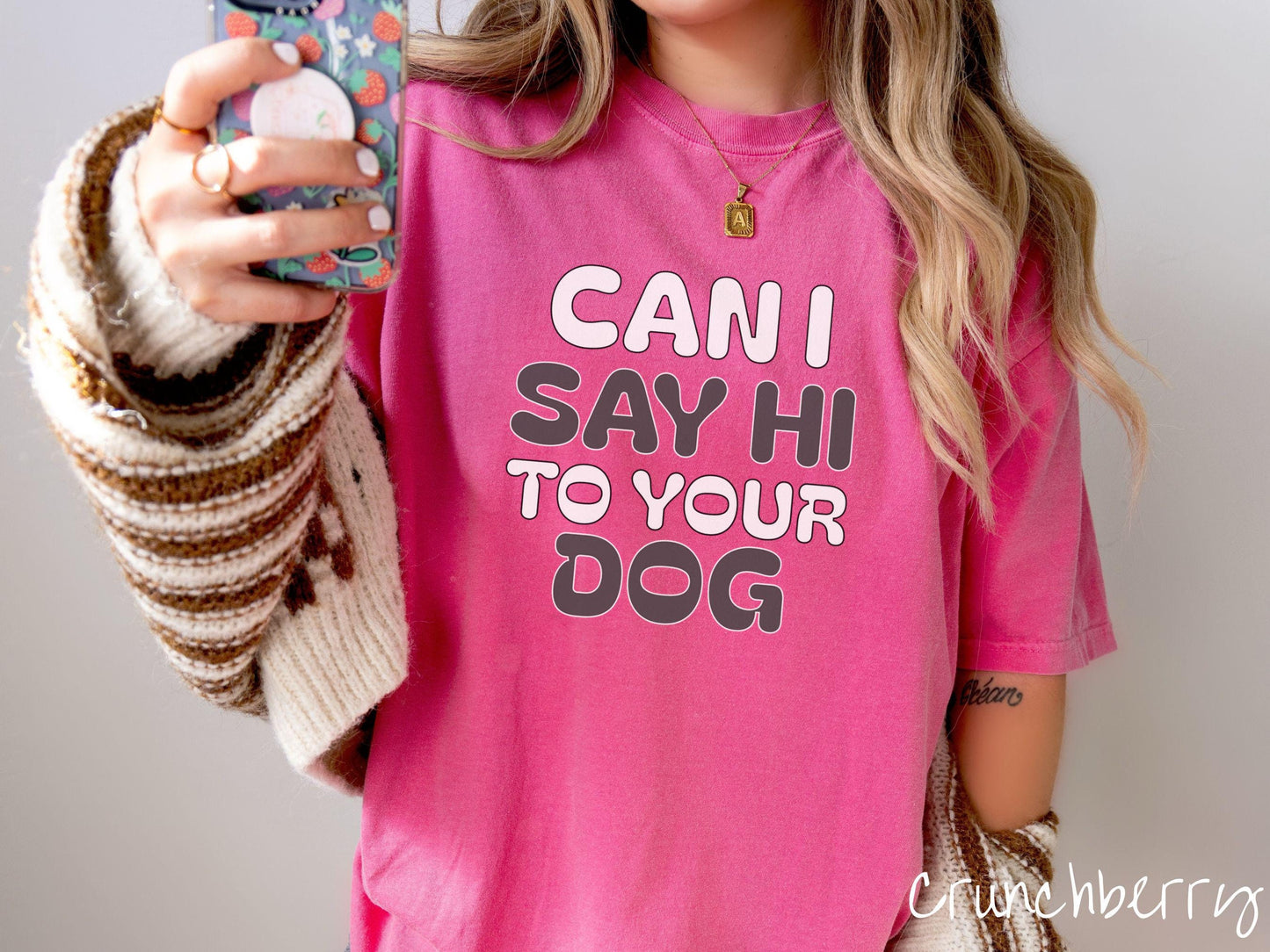 This vintage Comfort Colors t-shirt is perfect for dog lovers who want to make a bold statement. Featuring the text "CAN I SAY HI TO YOUR DOG" in uppercase black and white font, this shirt combines comfort and style with a playful message.