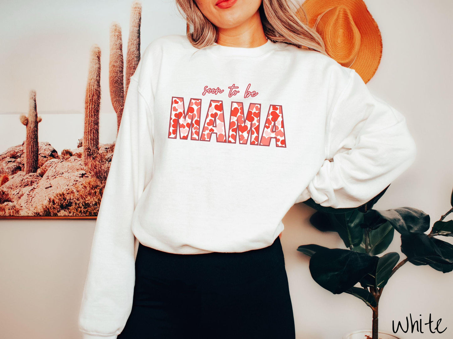 Celebrate your journey to motherhood with this vintage Gildan sweatshirt featuring the phrase “Soon to Be Mama” in bold red font, and the word “Mama” stands out in block letters filled with colorful hearts for a playful and charming touch.