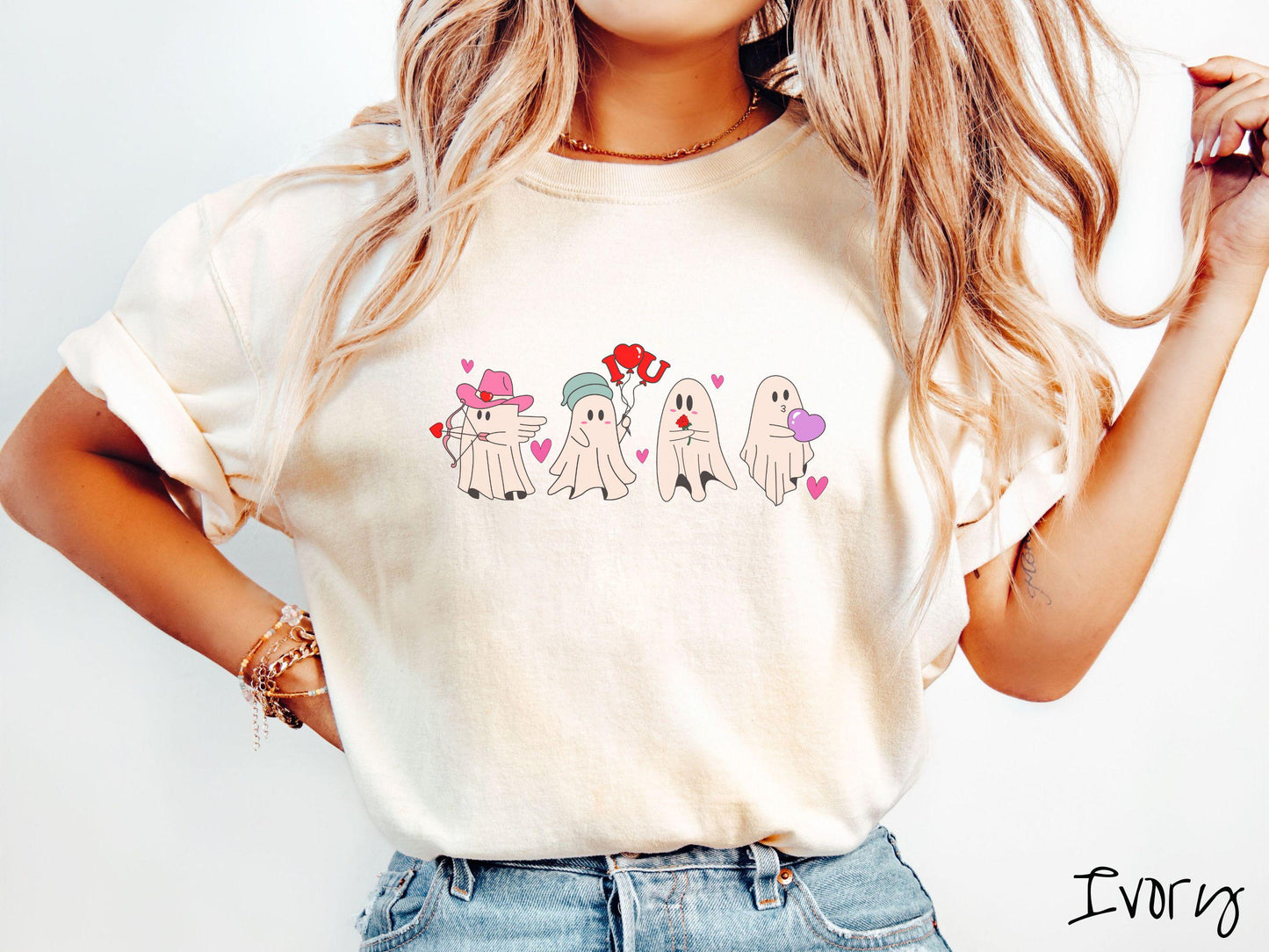 A vintage Comfort Colors t-shirt featuring four adorable ghosts with romantic details like a cowboy hat, heart-tipped arrows, "I Love You" balloons, a red rose, and a purple heart balloon, plus pink hearts for a whimsical touch.