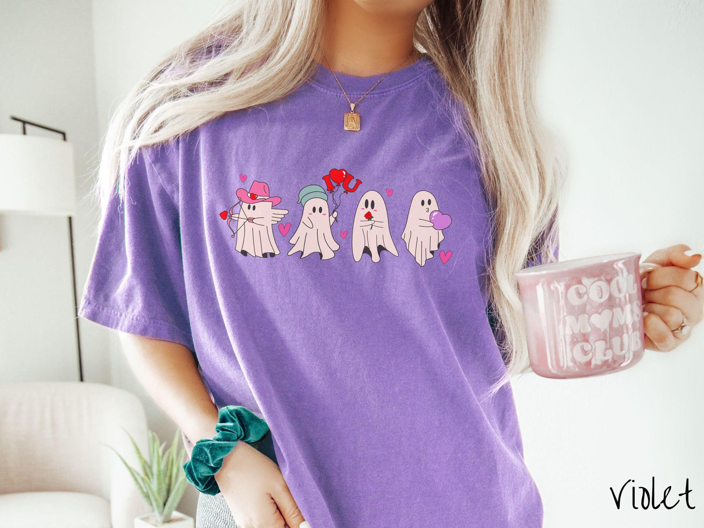 A vintage Comfort Colors t-shirt featuring four adorable ghosts with romantic details like a cowboy hat, heart-tipped arrows, "I Love You" balloons, a red rose, and a purple heart balloon, plus pink hearts for a whimsical touch.