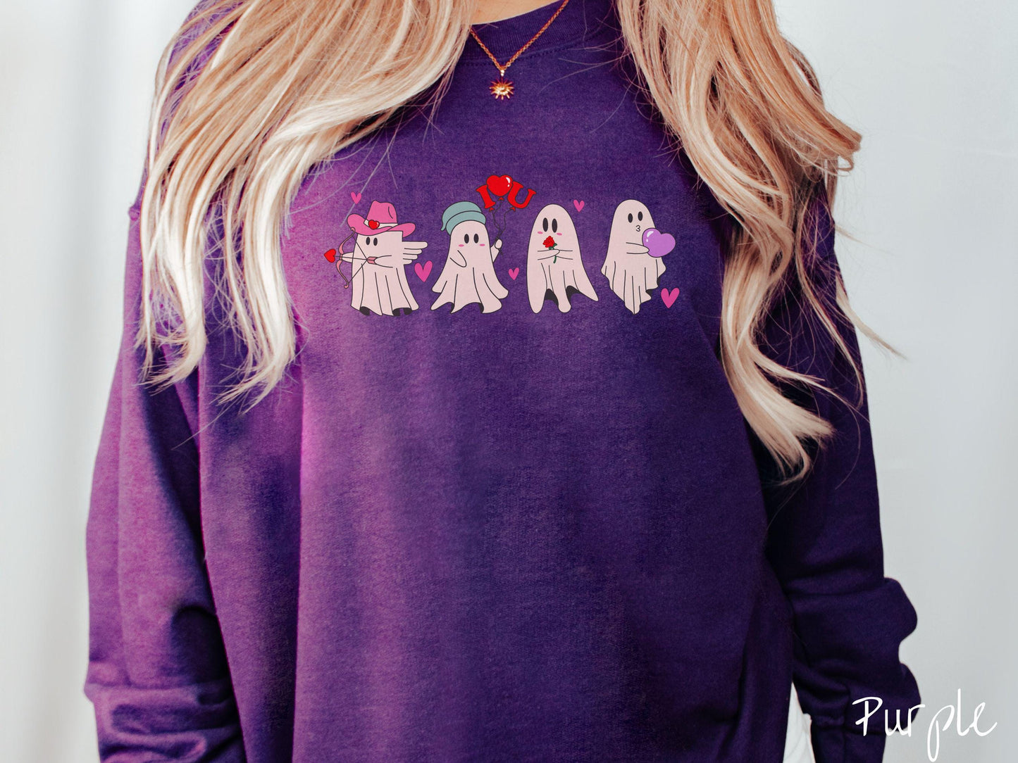 A vintage Gildan sweatshirt featuring four adorable ghosts with romantic details like a cowboy hat, heart-tipped arrows, "I Love You" balloons, a red rose, and a purple heart balloon, plus pink hearts for a whimsical touch.