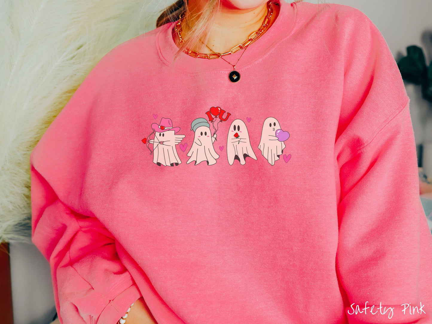 A vintage Gildan sweatshirt featuring four adorable ghosts with romantic details like a cowboy hat, heart-tipped arrows, "I Love You" balloons, a red rose, and a purple heart balloon, plus pink hearts for a whimsical touch.