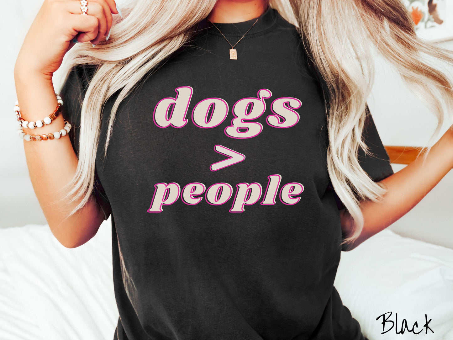A vintage Comfort Colors t-shirt is perfect for dog lovers who know that dogs are greater than people! Featuring the funny saying Dogs > People, this tee is a must-have for anyone who prefers the company of their furry friends over humans.
