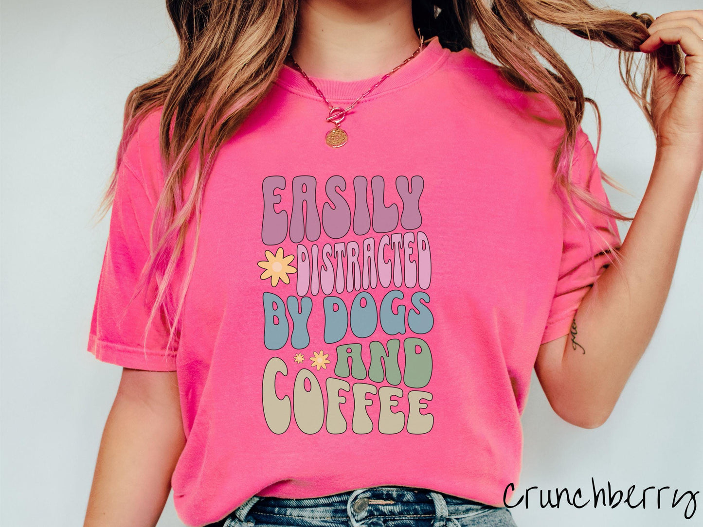 This vintage Comfort Colors t-shirt is a must-have for anyone who loves dogs, coffee, and a touch of humor! Featuring the funny saying Easily Distracted by Dogs and Coffee in vibrant, round font, this design adds a playful vibe to your wardrobe.