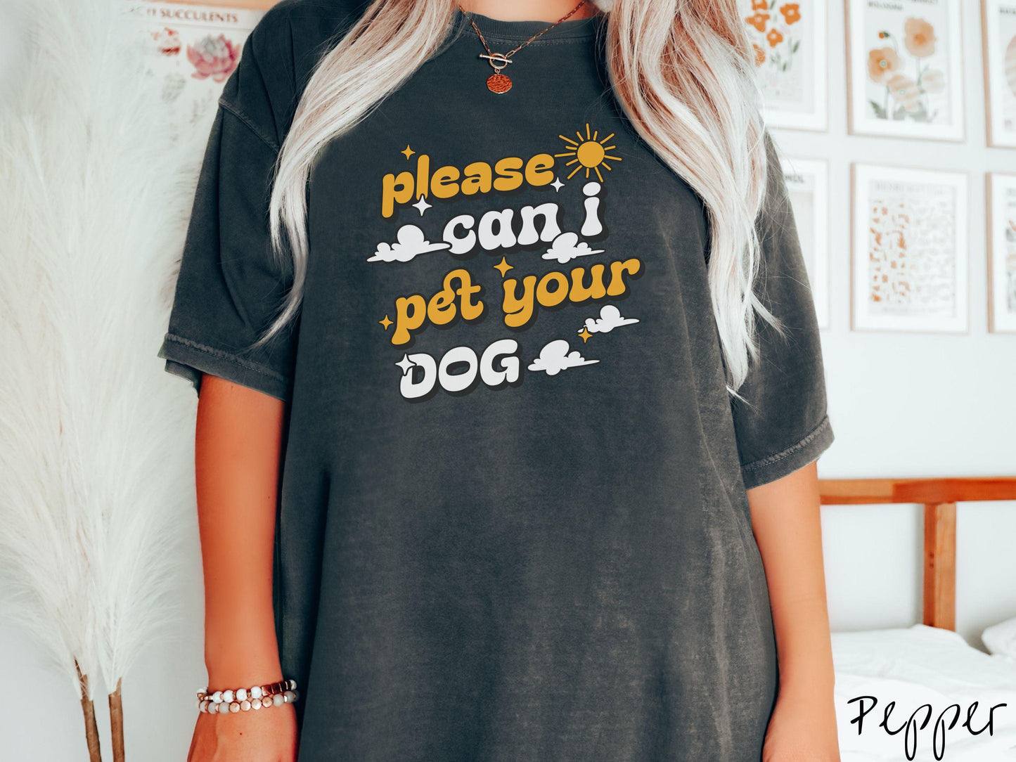 A vintage Comfort Colors t-shirt perfect for dog lovers who just can’t resist asking, “Please, can I pet your dog?” Featuring this fun phrase in orange and white font, this sweatshirt is a must-have for anyone who loves petting every pup they see.
