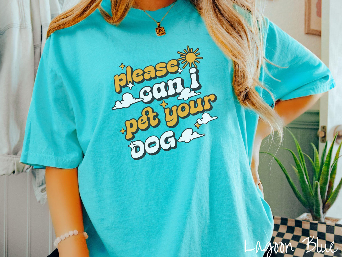A vintage Comfort Colors t-shirt perfect for dog lovers who just can’t resist asking, “Please, can I pet your dog?” Featuring this fun phrase in orange and white font, this sweatshirt is a must-have for anyone who loves petting every pup they see.