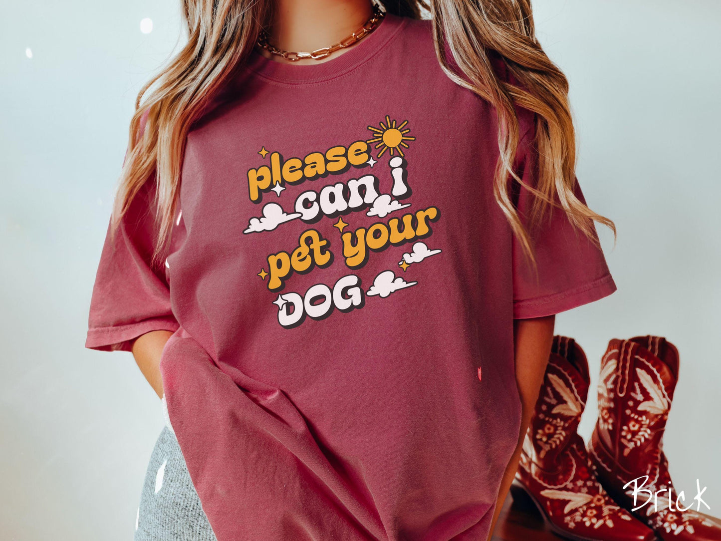 A vintage Comfort Colors t-shirt perfect for dog lovers who just can’t resist asking, “Please, can I pet your dog?” Featuring this fun phrase in orange and white font, this sweatshirt is a must-have for anyone who loves petting every pup they see.