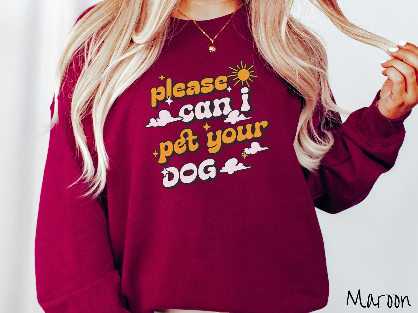 This cozy Gildan sweatshirt is perfect for dog lovers who just can’t resist asking, “Please, can I pet your dog?” Featuring this fun phrase in orange and white font, this sweatshirt is a must-have for anyone who loves petting every pup they see.