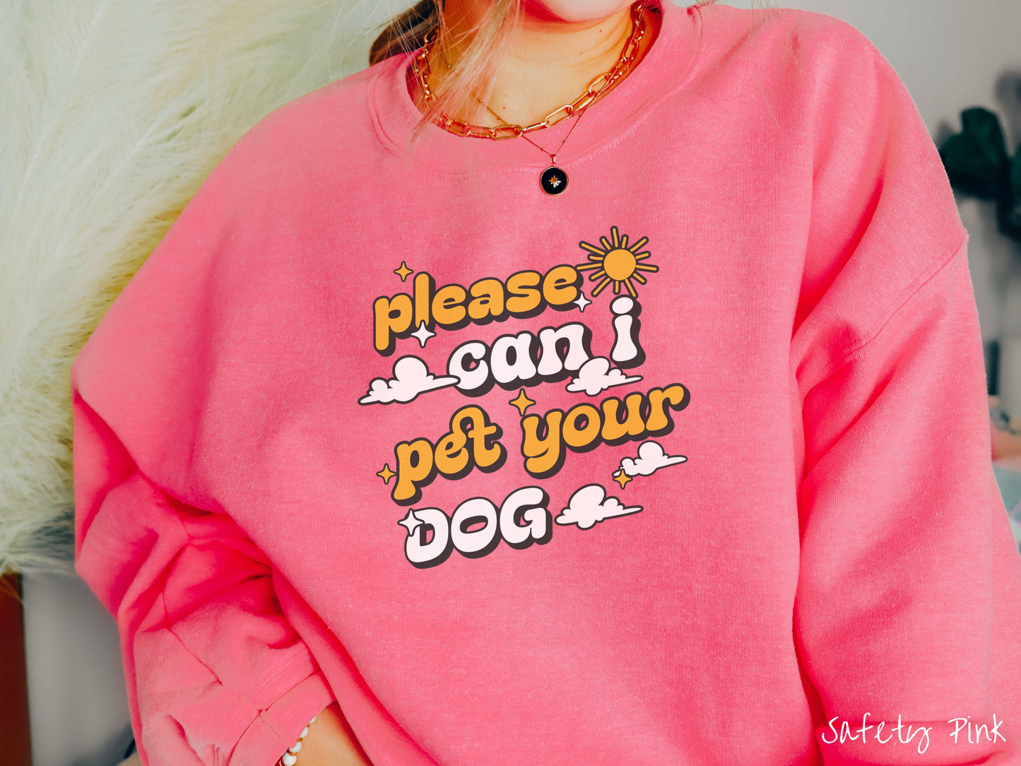 This cozy Gildan sweatshirt is perfect for dog lovers who just can’t resist asking, “Please, can I pet your dog?” Featuring this fun phrase in orange and white font, this sweatshirt is a must-have for anyone who loves petting every pup they see.