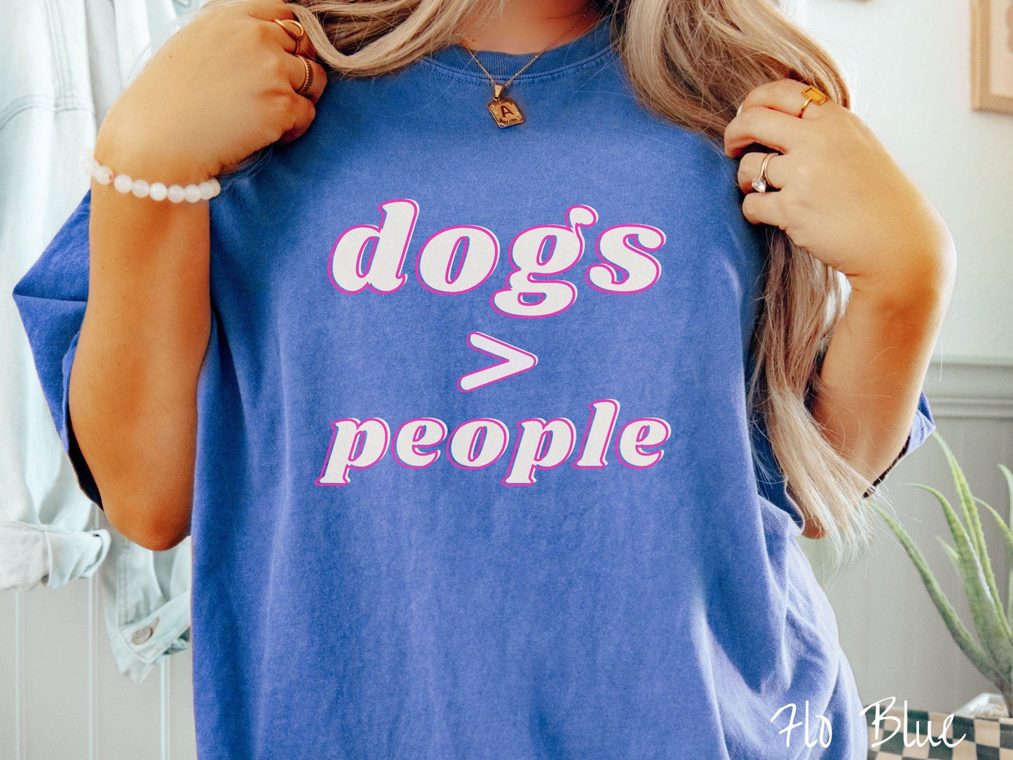 A vintage Comfort Colors t-shirt is perfect for dog lovers who know that dogs are greater than people! Featuring the funny saying Dogs > People, this tee is a must-have for anyone who prefers the company of their furry friends over humans.