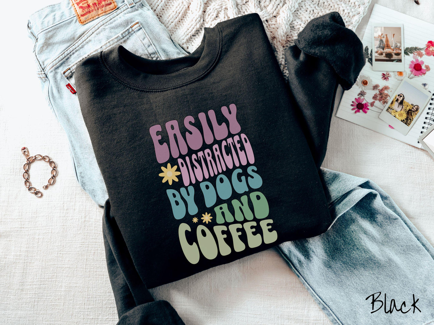 This vintage Gildan sweatshirt is a must-have for anyone who loves dogs, coffee, and a touch of humor! Featuring the funny saying Easily Distracted by Dogs and Coffee in vibrant, round font, this design adds a playful vibe to your wardrobe.