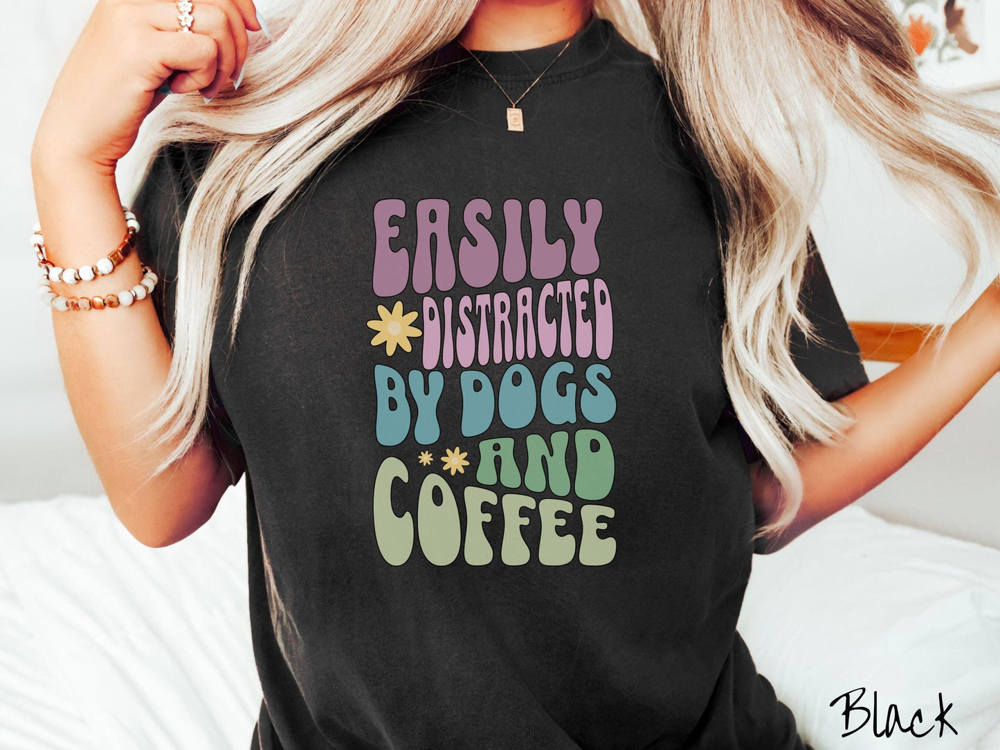 This vintage Comfort Colors t-shirt is a must-have for anyone who loves dogs, coffee, and a touch of humor! Featuring the funny saying Easily Distracted by Dogs and Coffee in vibrant, round font, this design adds a playful vibe to your wardrobe.