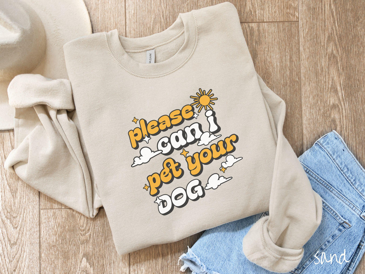 This cozy Gildan sweatshirt is perfect for dog lovers who just can’t resist asking, “Please, can I pet your dog?” Featuring this fun phrase in orange and white font, this sweatshirt is a must-have for anyone who loves petting every pup they see.