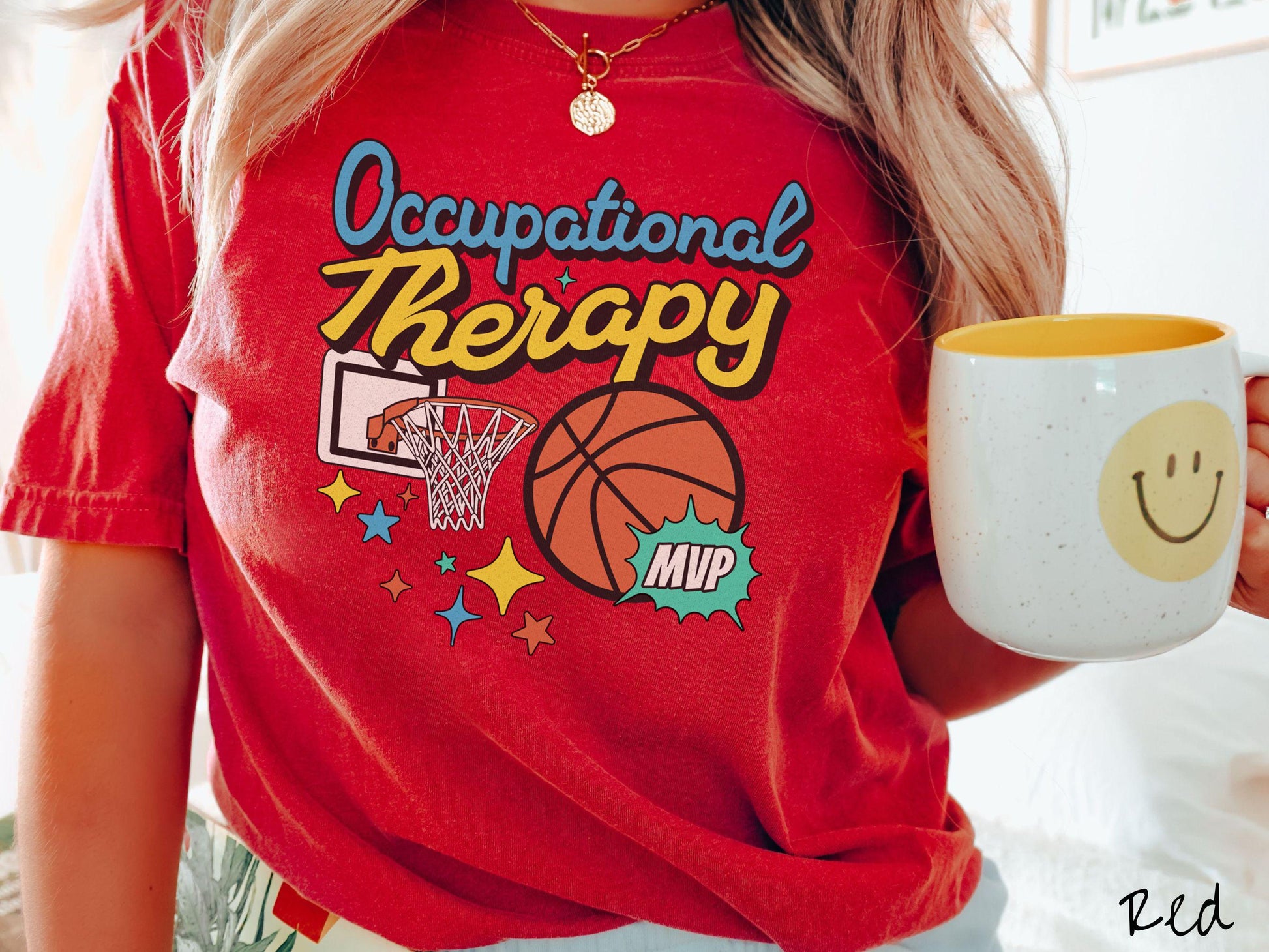 A vintage, red colored Comfort Colors T-Shirt features the phrase "Occupational Therapy" above a basketball goal, complemented by a bold basketball graphic with the text "MVP".