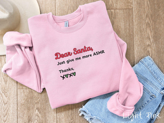 A cute, vintage light pink colored Gildan sweatshirt with the text in red, black, and green font: Dear Santa, Just give me more ASMR Thanks, X