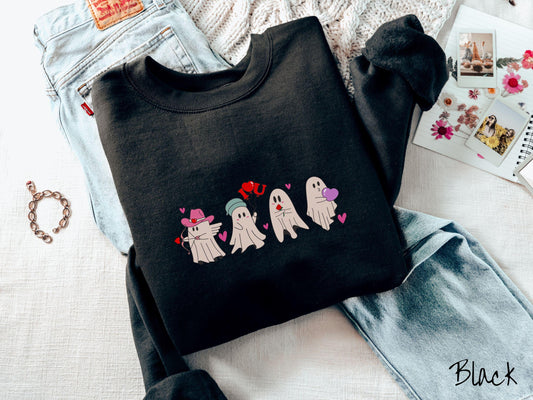 A vintage Gildan sweatshirt featuring four adorable ghosts with romantic details like a cowboy hat, heart-tipped arrows, &quot;I Love You&quot; balloons, a red rose, and a purple heart balloon, plus pink hearts for a whimsical touch.