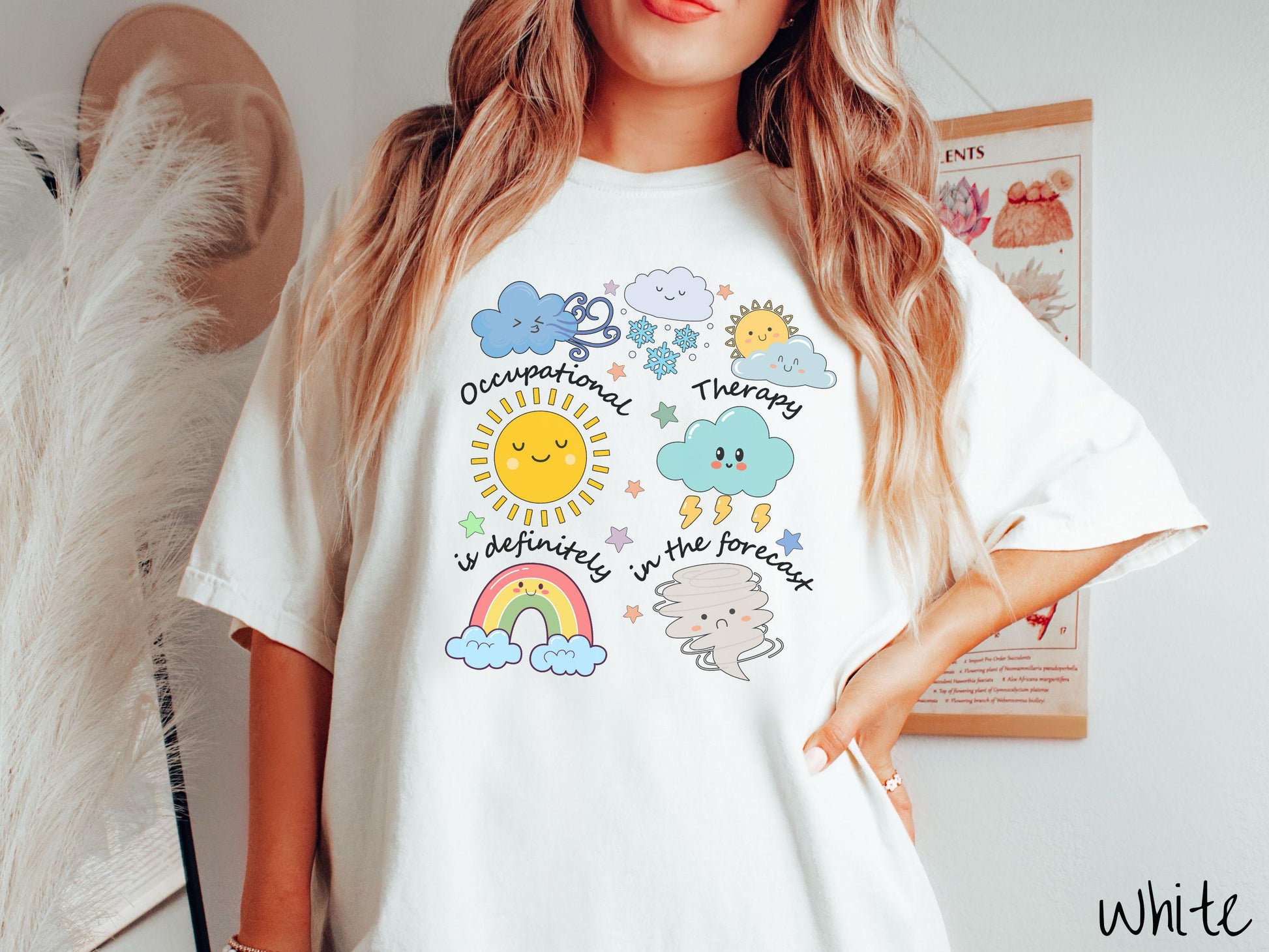 A vintage, white colored Comfort Colors T-shirt featuring the text Occupational Therapy is definitely in the forecast and surrounded by weather elements like clouds, rain clouds, a shining sun, lightning, a rainbow, and a tornado.