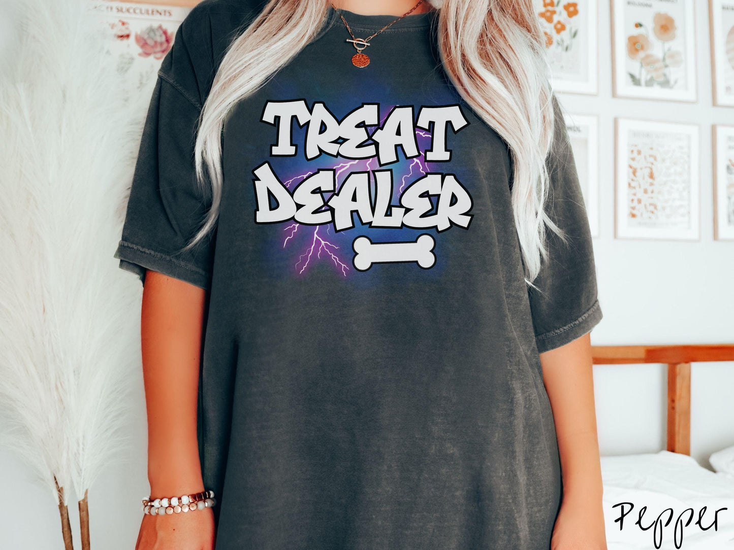 A vintage Comfort Colors t-shirt for dog lovers who always have treats on hand! Featuring the playful text Treat Dealer in graffiti-style white font, this design makes a fun statement for pet parents, dog trainers, and anyone who spoils their pup.