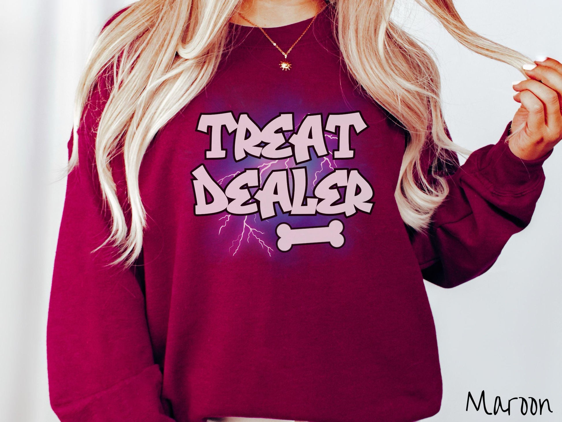 A vintage Gildan sweatshirt for dog lovers who always have treats on hand! Featuring the playful text Treat Dealer in graffiti-style white font, this design makes a fun statement for pet parents, dog trainers, and anyone who spoils their pup.