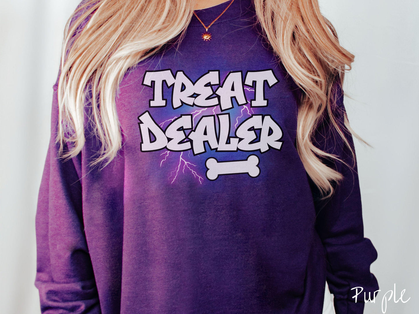 A vintage Gildan sweatshirt for dog lovers who always have treats on hand! Featuring the playful text Treat Dealer in graffiti-style white font, this design makes a fun statement for pet parents, dog trainers, and anyone who spoils their pup.