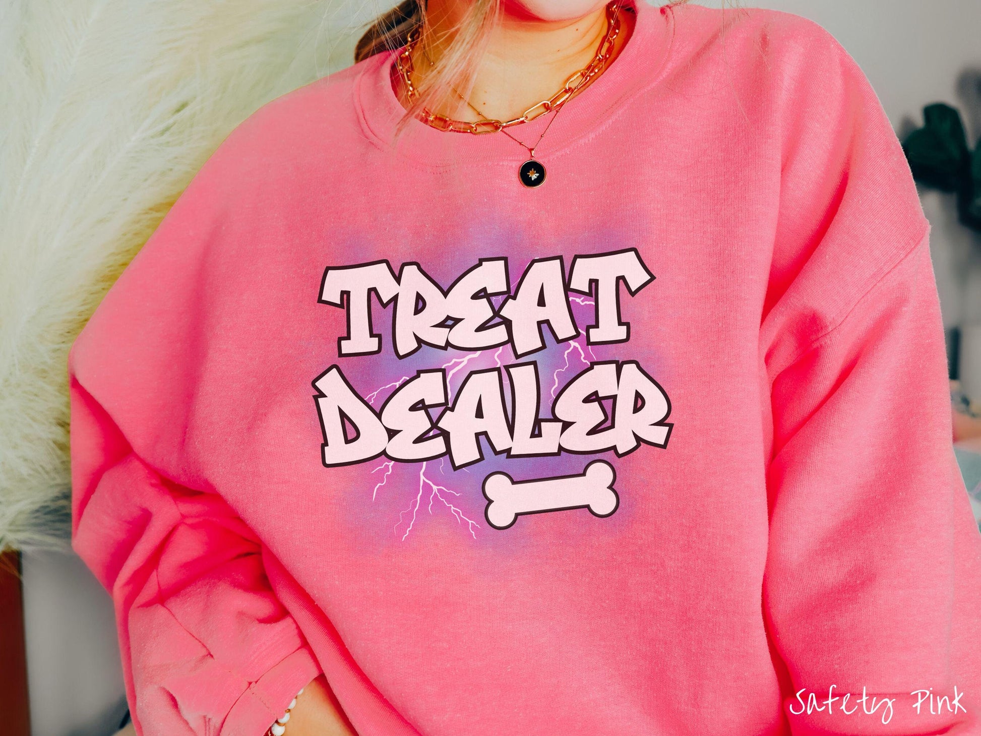 A vintage Gildan sweatshirt for dog lovers who always have treats on hand! Featuring the playful text Treat Dealer in graffiti-style white font, this design makes a fun statement for pet parents, dog trainers, and anyone who spoils their pup.