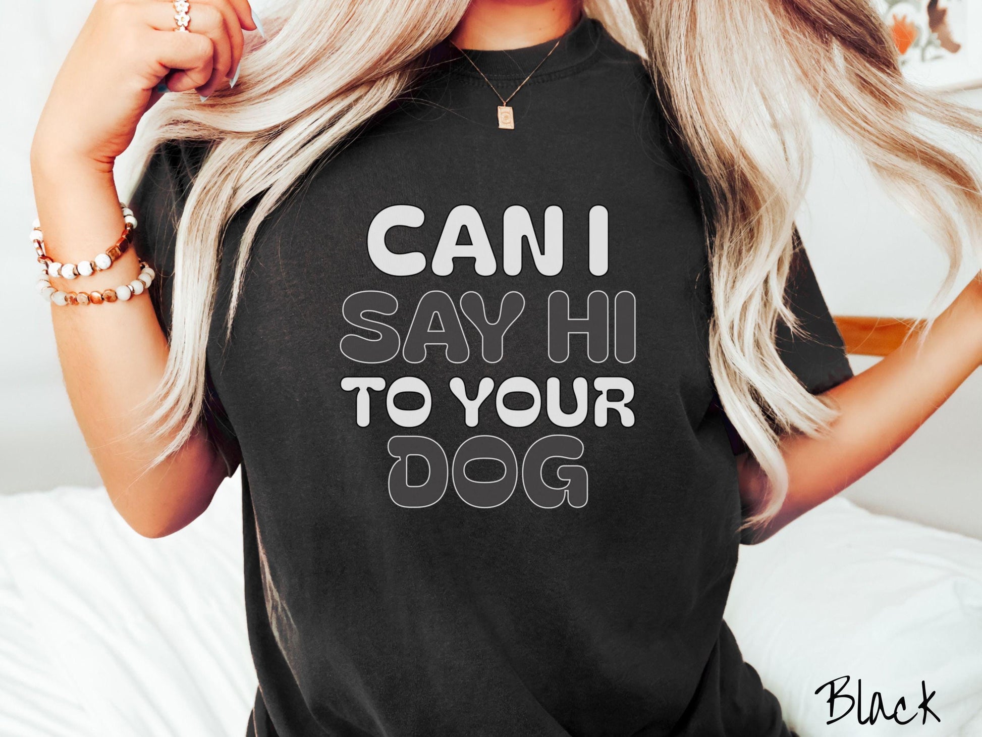 This vintage Comfort Colors t-shirt is perfect for dog lovers who want to make a bold statement. Featuring the text "CAN I SAY HI TO YOUR DOG" in uppercase black and white font, this shirt combines comfort and style with a playful message.