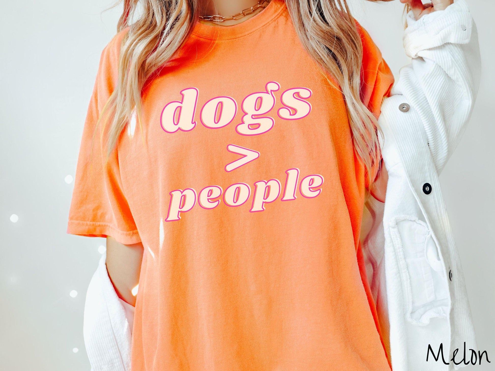 A vintage Comfort Colors t-shirt is perfect for dog lovers who know that dogs are greater than people! Featuring the funny saying Dogs &gt; People, this tee is a must-have for anyone who prefers the company of their furry friends over humans.