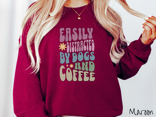 This vintage Gildan sweatshirt is a must-have for anyone who loves dogs, coffee, and a touch of humor! Featuring the funny saying Easily Distracted by Dogs and Coffee in vibrant, round font, this design adds a playful vibe to your wardrobe.