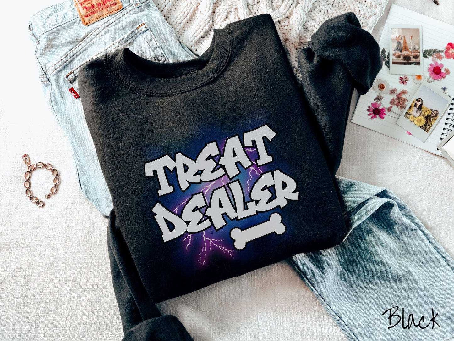 A vintage Gildan sweatshirt for dog lovers who always have treats on hand! Featuring the playful text Treat Dealer in graffiti-style white font, this design makes a fun statement for pet parents, dog trainers, and anyone who spoils their pup.