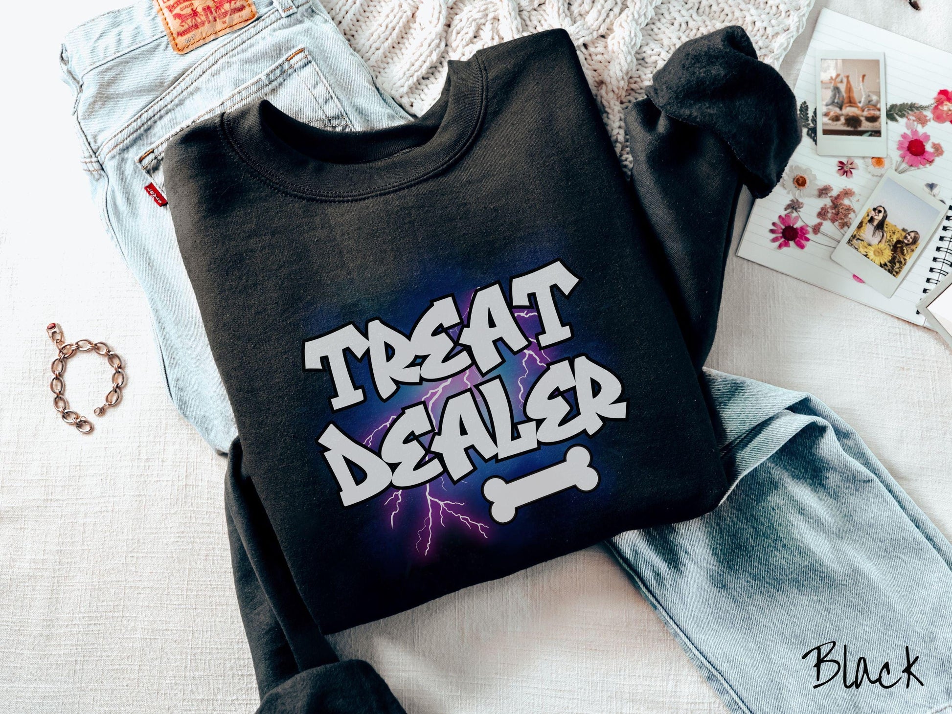 A vintage Gildan sweatshirt for dog lovers who always have treats on hand! Featuring the playful text Treat Dealer in graffiti-style white font, this design makes a fun statement for pet parents, dog trainers, and anyone who spoils their pup.